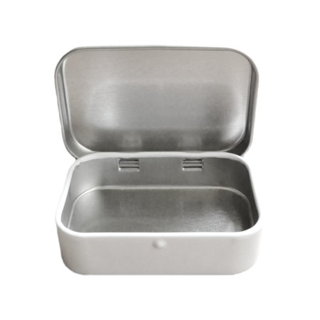 Valge metallist karp hambapesutablettidele